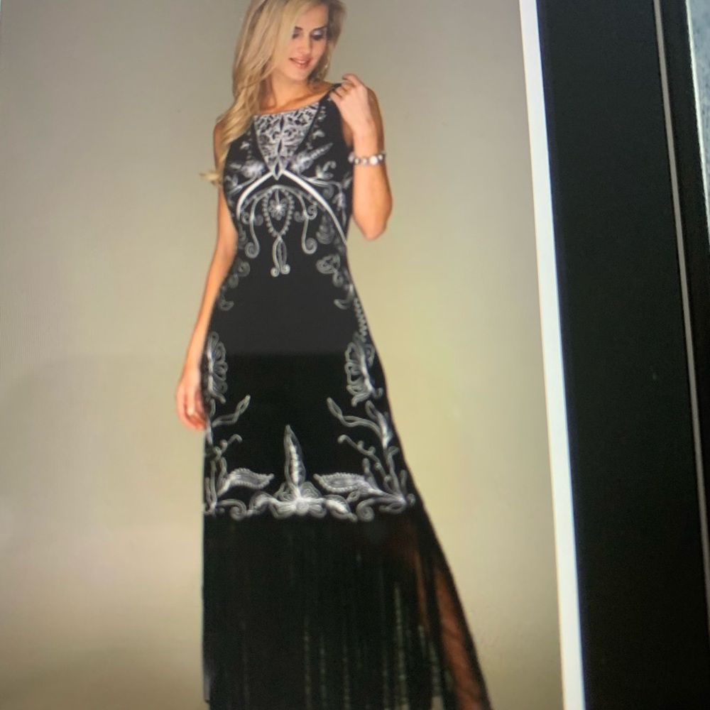 Beautiful Black and white trim dress. Bought as mother of the Groom.